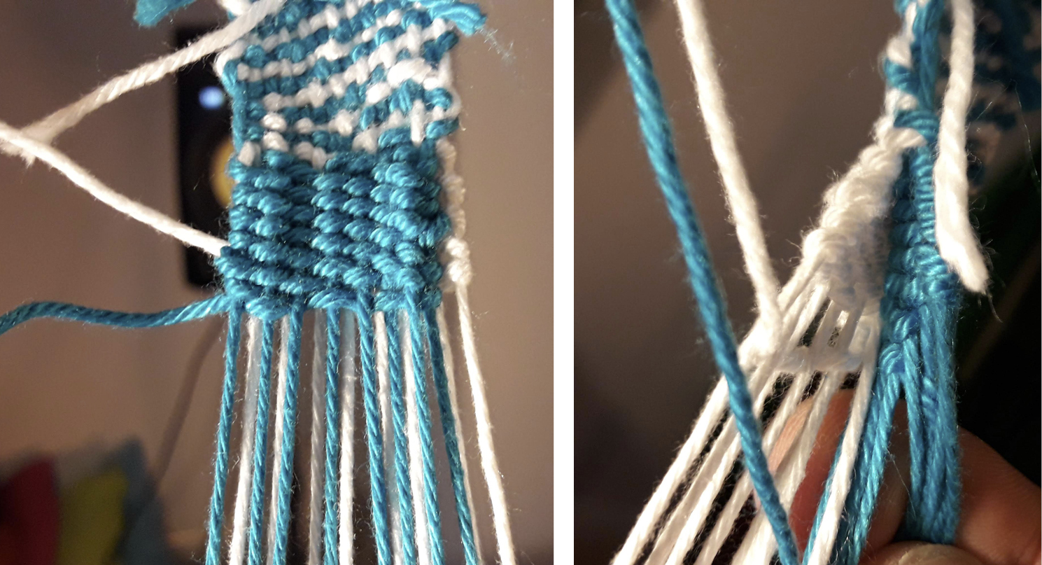 Close up of a braid on the live loom showing a double weave in the form of a split into a blue and a white ribbon.